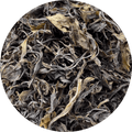 Emerald green loose leaf green tea Darjeeling first flush leaves close up Brook37