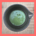Harmony matcha prepared tea smooth foam surface close up Brook37