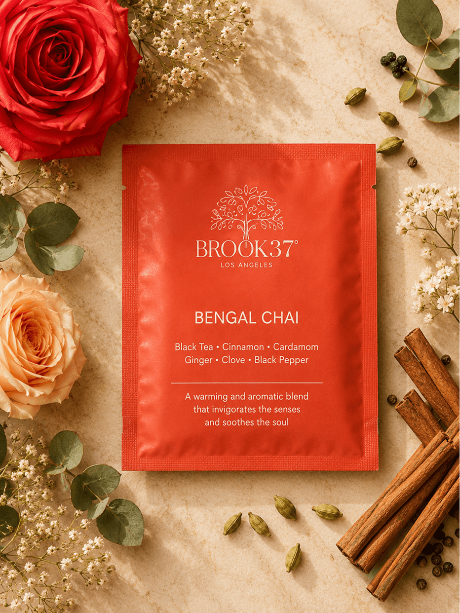 Brook37 Bengal Chai tea bag with cinnamon sticks and roses on a beige background