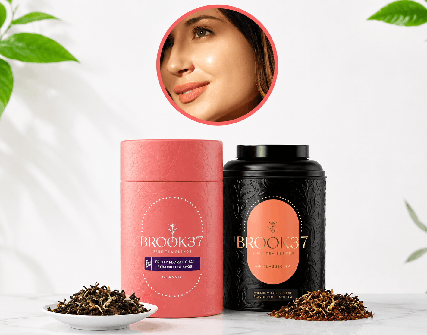Two BROOK37 tea products on a white background with decorative leaves and a circular inset showing a woman's face. The left container is matte coral pink with a purple label, and the right container is black with a peach label.